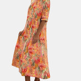 Emma | Vestido midi floral suelto y ligero