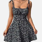 Vestido mini de mujer con estampado floral y tirantes anudados