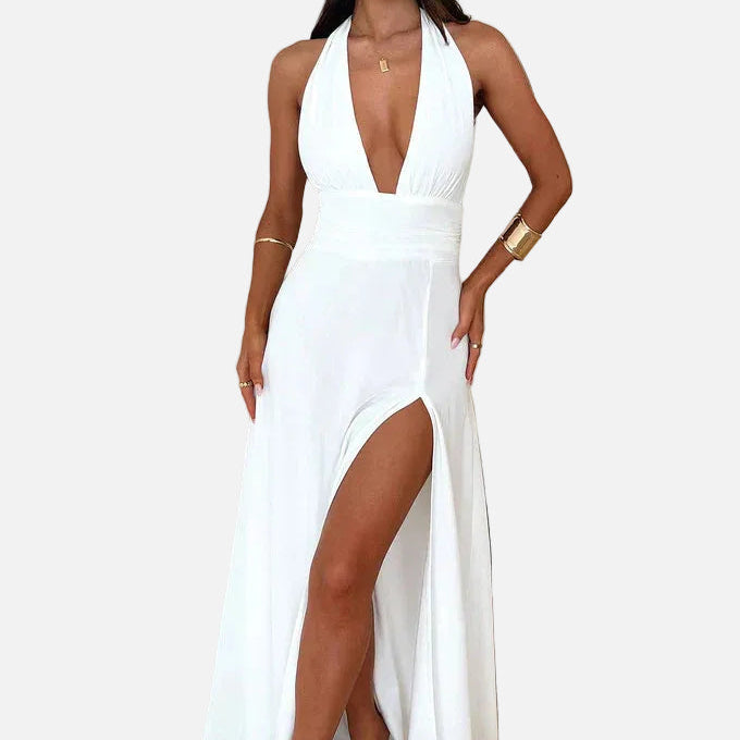 Elegante vestido maxi de invitada de boda con cuello halter y abertura en la pierna