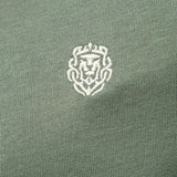 Mathias™ | Polo de Escudo Real