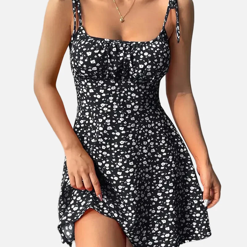 Vestido mini floral para mujer con tirantes anudados y bajo acampanado