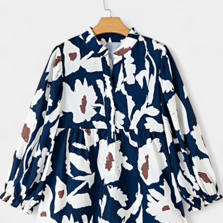Blusa Filomena con Media Abotonadura y Mangas Abullonadas en Estampado Floral Abstracto